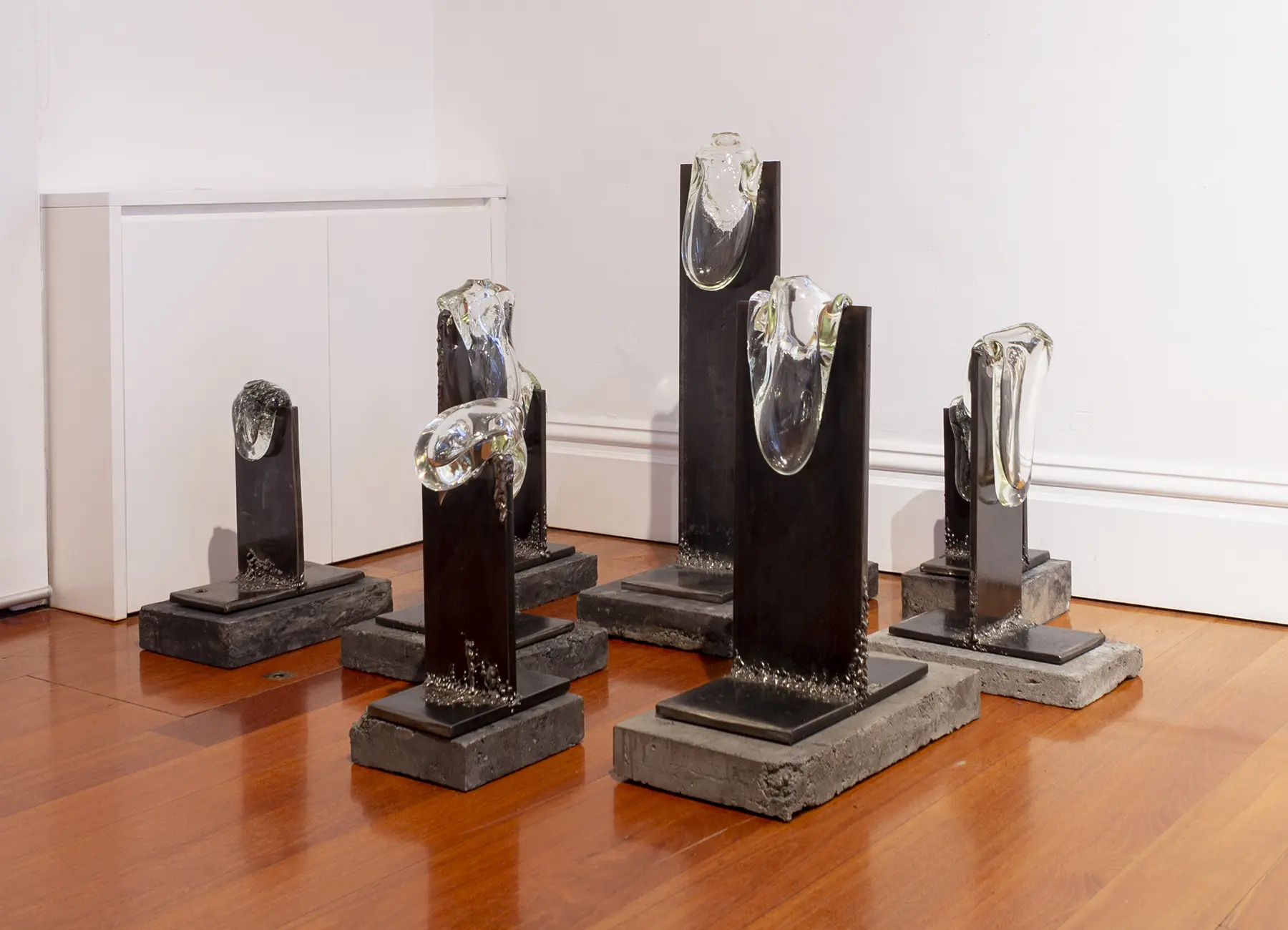 Stevie-Fielsdsend_As-we-melted-into-eachother-series.-Mixture-of-clearmirrored-silver-speckled-glass-steel-and-concrete-plinths-2