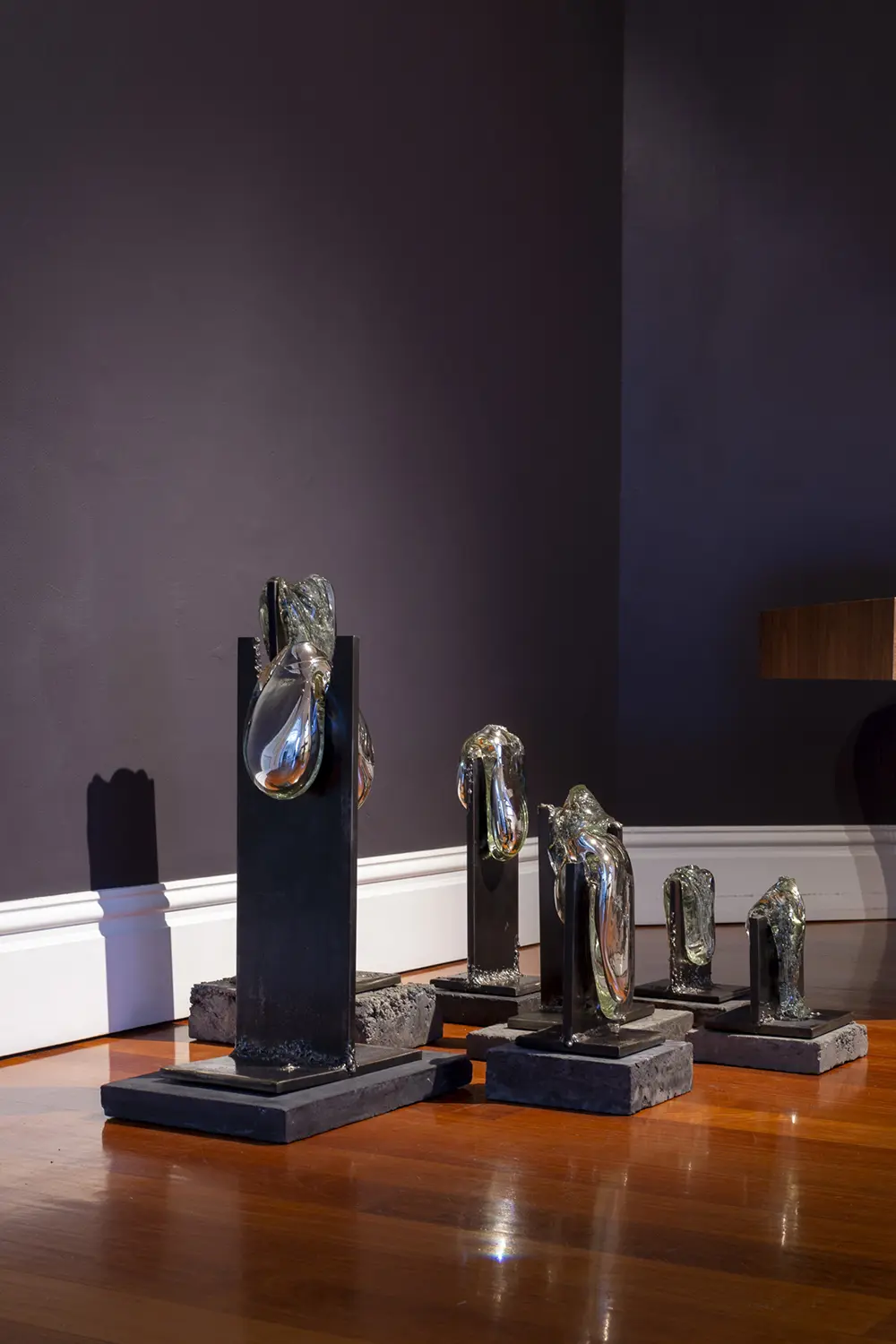 Stevie-Fielsdsend_As-we-melted-into-eachother-series.-Mixture-of-clearmirrored-silver-speckled-glass-steel-and-concrete-plinths-2020.4